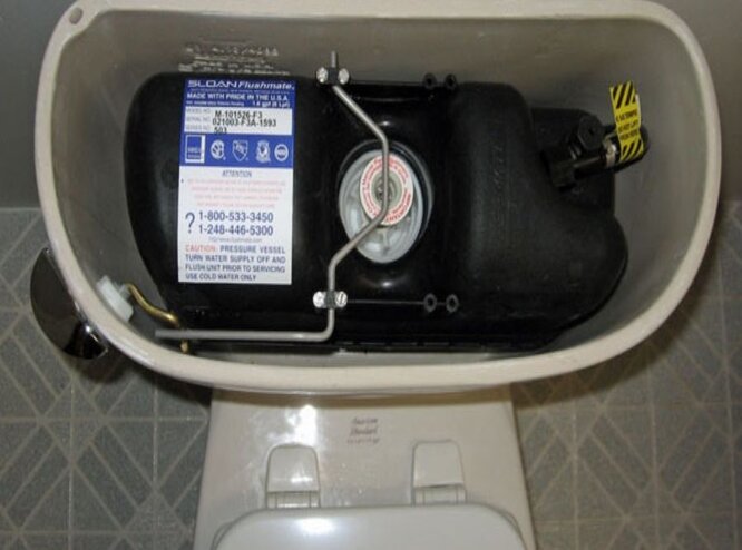 Pressure-assisted toilets